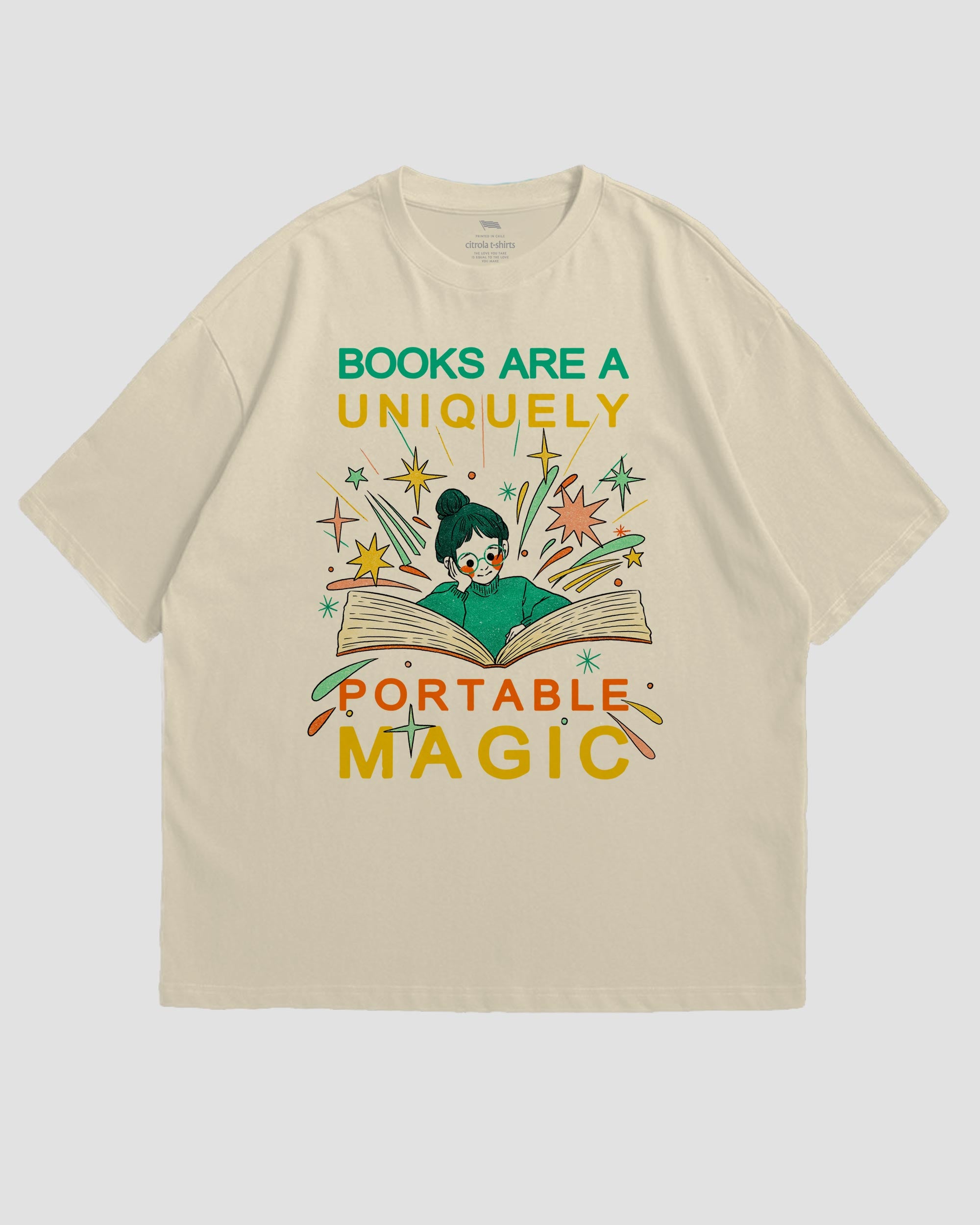 BOOKS ARE A UNIQUELY PORTABLE MAGIC UNISEX TEE