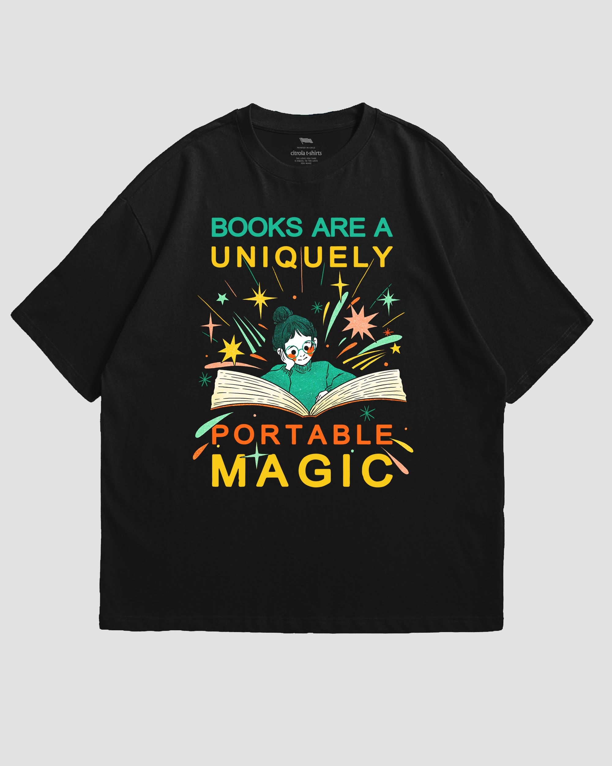 BOOKS ARE A UNIQUELY PORTABLE MAGIC UNISEX TEE